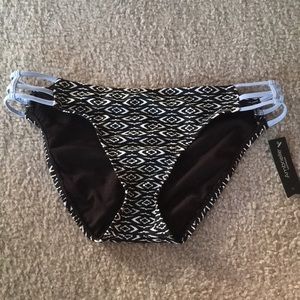 NEW black patterned swim bottoms.